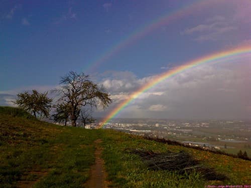 arc en ciel après orage de grèle.